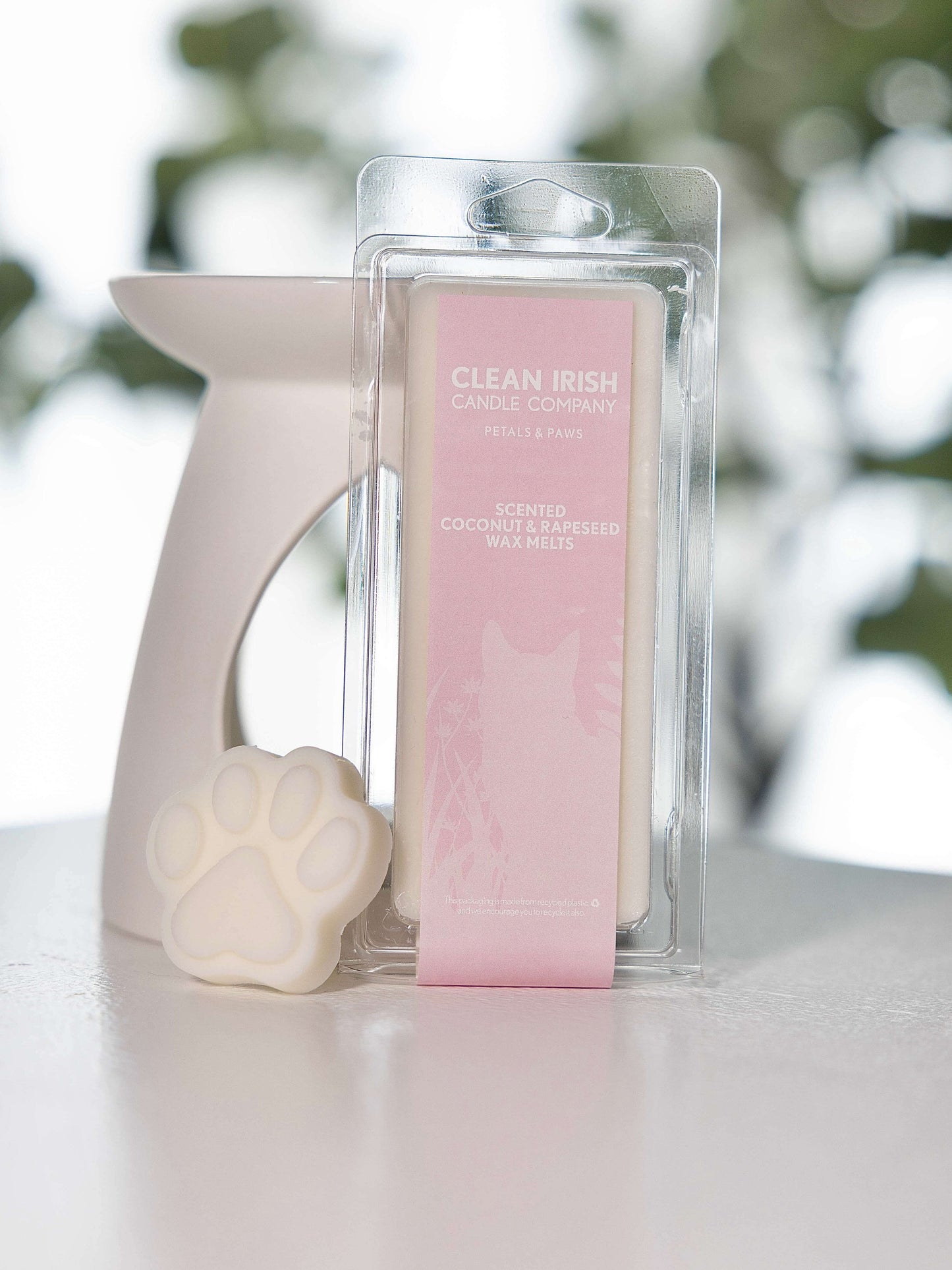 Petals & Paws Non-toxic Irish Scented Wax Melt Bar displayed with a paw-shaped wax melt on a bright surface.